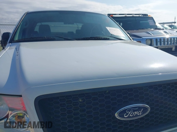 2004 Ford F-150 XLT z VIN 1FTPX04514KB70491, wystawiony jako IAAI lot #41320139 z przebiegiem 131 891 mil mil oraz . Historia ofert i sprzedaży dostępna na DreamBid. Obrazek 19.