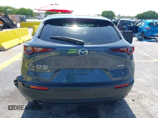 2024 Mazda CX-30 S Carbon Edition z VIN 3MVDMBCM0RM661018, wystawiony jako IAAI lot #42326256 z przebiegiem 22 169 mil mil oraz . Historia ofert i sprzedaży dostępna na DreamBid. Obrazek 16.