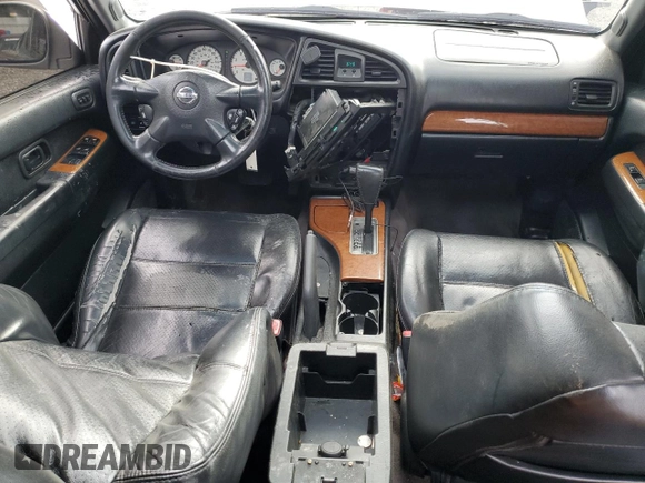 2003 Nissan Pathfinder LE z VIN JN8DR09Y73W801482, wystawiony jako Copart lot #56216005 z przebiegiem 238 781 mil mil oraz Szkoda całkowita • Salvage title. Historia ofert i sprzedaży dostępna na DreamBid. Obrazek 8.