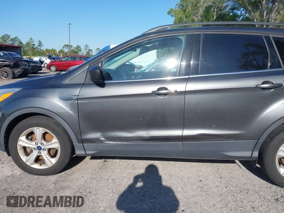2016 Ford Escape SE with VIN 1FMCU9GX3GUB78749, listed as a IAAI auction lot 42030262 with 93,365 mi miles. Bid and sale history available at carsss.com. Image 17.