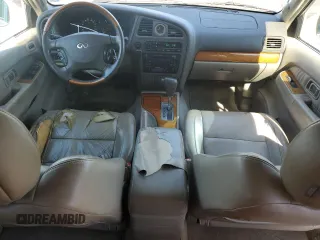 2003 Infiniti QX4 with VIN JNRDR09X33W250292, listed as a Copart auction lot 56020474 with 260,391 mi miles and Clean Title. Bid and sale history available at DreamBid. Image 8.