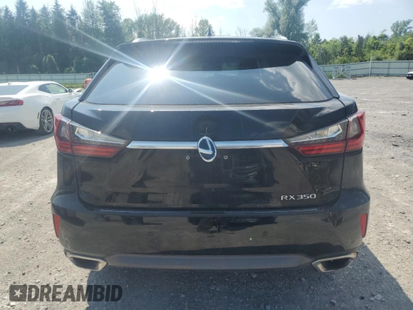2016 Lexus RX 350 with VIN 2T2BZMCA9GC010001, listed as a Copart auction lot 66301085 with 116,091 mi miles and Salvage title. Bid and sale history available at DreamBid. Image 6.