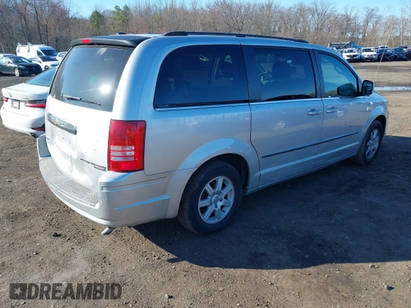 2010 Chrysler Town & Country Touring with VIN 2A4RR5D14AR359169, listed as a IAAI auction lot 41900856 with 204,595 mi miles and . Bid and sale history available at DreamBid. Image 4.