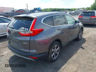 2018 Honda CR-V EX with VIN 2HKRW2H58JH613523, listed as a IAAI auction lot 42104837 with 122,981 mi miles and . Bid and sale history available at DreamBid. Image 4.