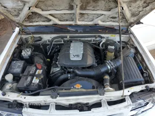 2000 Isuzu Rodeo S z VIN 4S2CK58W8Y4340907, wystawiony jako Copart lot #79683804 z przebiegiem 153 419 mil mil oraz Szkoda całkowita • Salvage title. Historia ofert i sprzedaży dostępna na DreamBid. Obrazek 12.