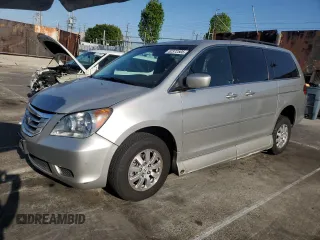 2009 Honda Odyssey EX-L with VIN 5FNRL38619B044063, listed as a Copart auction lot 52372505 with 204,658 mi miles and Salvage Title. Bid and sale history available at carsss.com. Image 1.