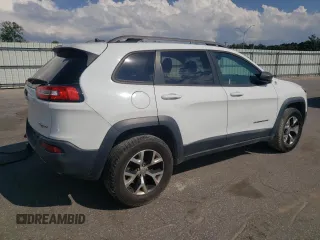 2014 Jeep Cherokee Trailhawk with VIN 1C4PJMBS5EW185510, listed as a Copart auction lot 55780005 with 130,358 mi miles and Clean title. Bid and sale history available at DreamBid. Image 3.