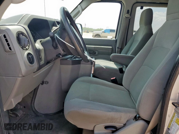 2009 Ford Econoline Passenger XL with VIN 1FBNE31L39DA56400, listed as a Copart auction lot 59878595 with 249,112 mi miles and Salvage title. Bid and sale history available at DreamBid. Image 7.