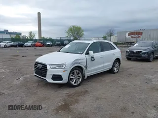 2017 Audi Q3 Premium z VIN WA1ECCFS7HR007729, wystawiony jako IAAI lot #42066580 z przebiegiem 116 460 mil mil oraz . Historia ofert i sprzedaży dostępna na DreamBid. Obrazek 2.