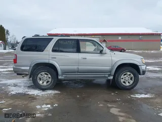 1998 Toyota 4Runner Limited with VIN JT3HN87RXW0144093, listed as a IAAI auction lot 41520901 with 205,623 mi miles. Bid and sale history available at carsss.com. Image 14.