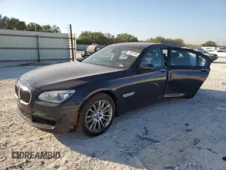 2015 BMW 7 Series 750Li with VIN WBAYE8C59FD781318, listed as a Copart auction lot 74053154 with 62,681 mi miles and Salvage Title. Bid and sale history available at carsss.com. Image 1.
