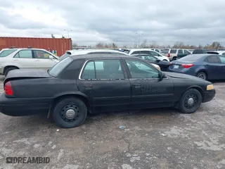 2011 Ford Crown Victoria with VIN 2FABP7AV4BX166216, listed as a IAAI auction lot 41268754 with 205,308 mi miles. Bid and sale history available at carsss.com. Image 13.