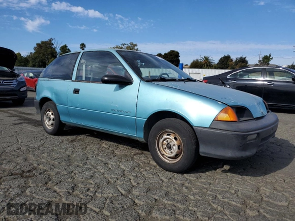 1992 Geo Metro z VIN 2C1MS2465N6782913, wystawiony jako Copart lot #77405574 z przebiegiem 77 080 mil mil oraz Szkody całkowita. Historia ofert i sprzedaży dostępna na DreamBid. Obrazek 4.
