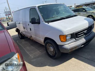 2006 Ford Econoline Cargo with VIN 1FTRE14W76HB24872, listed as a IAAI auction lot 42081212 with Not Provided miles. Bid and sale history available at carsss.com. Image 1.