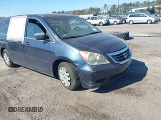 2010 Honda Odyssey LX with VIN 5FNRL3H20AB106196, listed as a IAAI auction lot 41685770 with 999,999 mi miles. Bid and sale history available at carsss.com. Image 1.