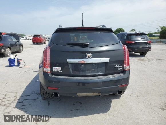 2012 Cadillac SRX Performance Collection z VIN 3GYFNEE38CS527089, wystawiony jako Copart lot #56700355 z przebiegiem 178 181 mil mil oraz Szkoda całkowita • Salvage title. Historia ofert i sprzedaży dostępna na DreamBid. Obrazek 6.