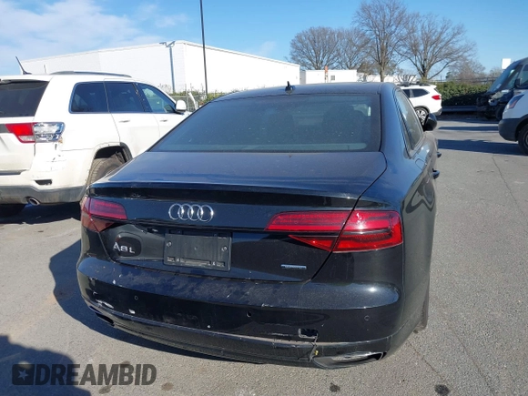 2017 Audi A8 with VIN WAU44AFD0HN017821, listed as a IAAI auction lot 41676097 with 107,378 mi miles and . Bid and sale history available at DreamBid. Image 16.