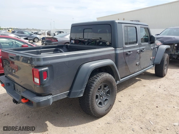 2022 Jeep Gladiator Mojave with VIN 1C6JJTEG5NL125968, listed as a IAAI auction lot 41654201 with 76,294 mi miles. Bid and sale history available at carsss.com. Image 4.