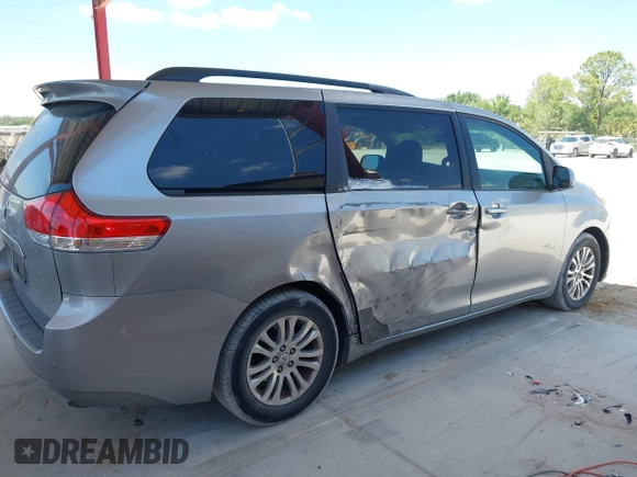2011 Toyota Sienna XLE AAS with VIN 5TDYK3DC1BS007820, listed as a IAAI auction lot 41935200 with 123,554 mi miles. Bid and sale history available at carsss.com. Image 6.