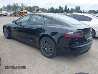 2021 Tesla Model S Plaid with VIN 5YJSA1E62MF447509, listed as a IAAI auction lot 42509281 with 32,372 mi miles and . Bid and sale history available at DreamBid. Image 3.