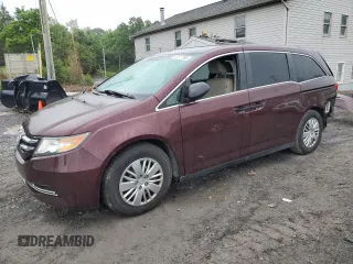 2014 Honda Odyssey LX z VIN 5FNRL5H24EB098072, wystawiony jako Copart lot #57577385 z przebiegiem 215 069 mil mil oraz Szkoda całkowita • Salvage title. Historia ofert i sprzedaży dostępna na DreamBid. Obrazek 1.