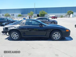 1995 Mitsubishi 3000GT GT z VIN JA3AM84J1SY026510, wystawiony jako IAAI lot #42298430 z przebiegiem 288 509 mil mil oraz . Historia ofert i sprzedaży dostępna na DreamBid. Obrazek 14.