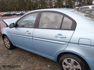 2011 Hyundai Accent GLS with VIN KMHCN4AC6BU587195, listed as a IAAI auction lot 41584866 with 168,303 mi miles. Bid and sale history available at carsss.com. Image 14.