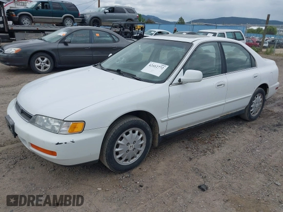 1997 Honda Accord with VIN 1HGCD5555VA127980, listed as a IAAI auction lot 42412772 with 235,367 mi miles and . Bid and sale history available at DreamBid. Image 2.