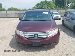 2011 Honda Odyssey EX-L with VIN 5FNRL5H6XBB096891, listed as a IAAI auction lot 42840531 with 214,842 mi miles and . Bid and sale history available at DreamBid. Image 13.