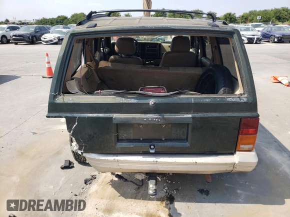 1995 Jeep Cherokee Country with VIN 1J4FJ78S4SL631318, listed as a Copart auction lot 63087634 with 295,577 mi miles and Salvage Title. Bid and sale history available at carsss.com. Image 6.