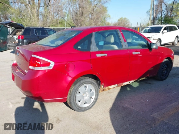 2010 Ford Focus S with VIN 1FAHP3ENXAW238107, listed as a IAAI auction lot 41974240 with 123,777 mi miles and . Bid and sale history available at carsss.com. Image 4.