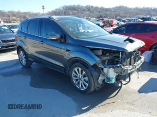 2017 Ford Escape Titanium with VIN 1FMCU0J92HUA26226, listed as a IAAI auction lot 41423259 with 111,076 mi miles. Bid and sale history available at carsss.com. Image 1.