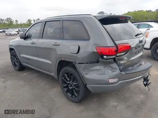 2021 Jeep Grand Cherokee Laredo X with VIN 1C4RJEAG4MC597302, listed as a IAAI auction lot 41919123 with 63,849 mi miles. Bid and sale history available at carsss.com. Image 3.