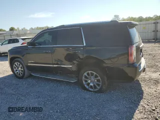2015 GMC Yukon Denali with VIN 1GKS2CKJ9FR173812, listed as a Copart auction lot 72577144 with 207,940 mi miles and Salvage Title. Bid and sale history available at carsss.com. Image 2.
