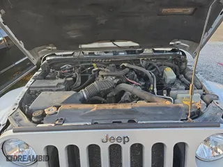 2011 Jeep Wrangler Unlimited Sahara with VIN 1J4BA5H16BL627992, listed as a Copart auction lot 49184625 with 197,845 mi miles and Clean Title. Bid and sale history available at carsss.com. Image 7.