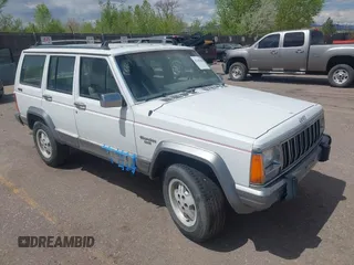 1992 Jeep Cherokee z VIN 1J4FJ58S0NL102716, wystawiony jako IAAI lot #42169406 z przebiegiem 197 167 mil mil oraz . Historia ofert i sprzedaży dostępna na DreamBid. Obrazek 1.