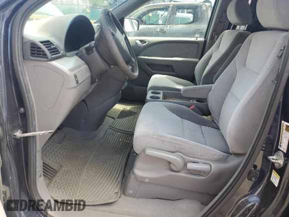 2009 Honda Odyssey LX z VIN 5FNRL38209B051664, wystawiony jako Copart lot #56710125 z przebiegiem 123 mil mil oraz Nie do naprawy • Non repairable. Historia ofert i sprzedaży dostępna na DreamBid. Obrazek 7.