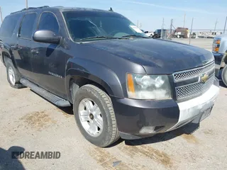 2011 Chevrolet Suburban LT with VIN 1GNSKJE34BR242629, listed as a IAAI auction lot 41898605 with 197,722 mi miles. Bid and sale history available at carsss.com. Image 1.