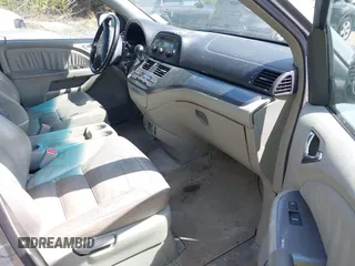 2006 Honda Odyssey EX-L with VIN 5FNRL38656B057877, listed as a IAAI auction lot 42199036 with 284,020 mi miles and . Bid and sale history available at carsss.com. Image 5.