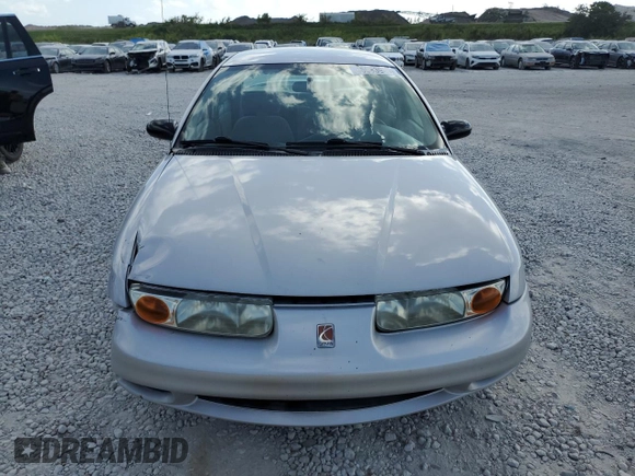 2000 Saturn SL z VIN 1G8ZK5276YZ224500, wystawiony jako Copart lot #45083945 z przebiegiem 130 766 mil mil oraz Szkoda całkowita • Salvage title. Historia ofert i sprzedaży dostępna na DreamBid. Obrazek 5.