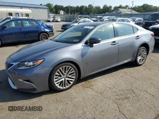 2016 Lexus ES 330 with VIN JTHBK1GG5G2212157, listed as a Copart auction lot 65879325 with 61,944 mi miles and Salvage title. Bid and sale history available at DreamBid. Image 1.