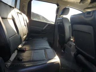 2005 Nissan Titan SE with VIN 1N6AA07B65N566549, listed as a Copart auction lot 80915034 with 268,827 mi miles and Salvage Title. Bid and sale history available at carsss.com. Image 11.