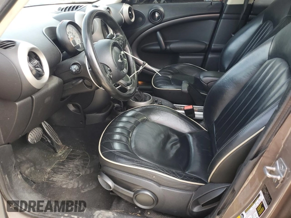 2011 MINI Countryman S with VIN WMWZC3C56BWH97944, listed as a Copart auction lot 58071315 with 176,528 mi miles and Clean title. Bid and sale history available at DreamBid. Image 7.