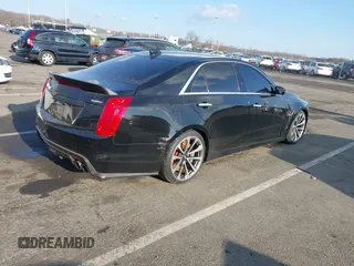 2016 Cadillac CTS-V z VIN 1G6A15S69G0148435, wystawiony jako IAAI lot #41306543 z przebiegiem 22 045 mil mil oraz . Historia ofert i sprzedaży dostępna na DreamBid. Obrazek 4.