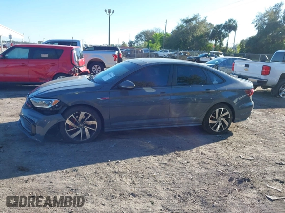 2019 Volkswagen Jetta GLI S z VIN 3VW6T7BU5KM169132, wystawiony jako IAAI lot #41599605 z przebiegiem 59 744 mil mil oraz . Historia ofert i sprzedaży dostępna na DreamBid. Obrazek 14.