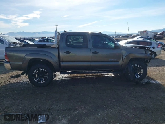 2014 Toyota Tacoma with VIN 3TMLU4EN3EM143882, listed as a IAAI auction lot 40657975 with 125,008 mi miles. Bid and sale history available at carsss.com. Image 13.