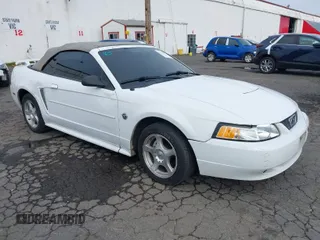 2004 Ford Mustang Deluxe with VIN 1FAFP446X4F134860, listed as a IAAI auction lot 41755643 with 174,410 mi miles. Bid and sale history available at carsss.com. Image 1.