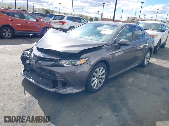 2020 Toyota Camry LE with VIN 4T1C11AK3LU363417, listed as a IAAI auction lot 41430382 with 130,837 mi miles. Bid and sale history available at carsss.com. Image 18.