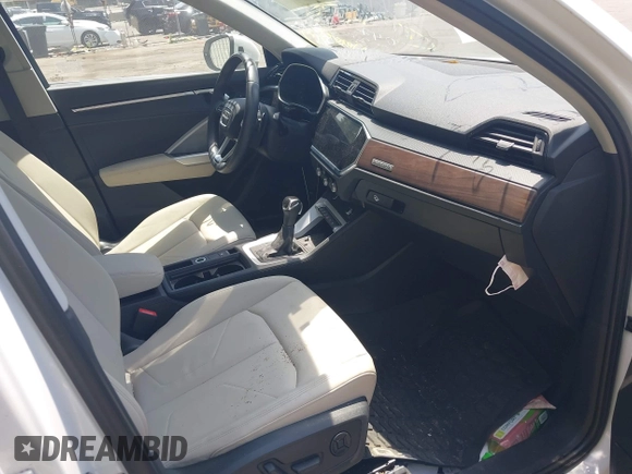 2021 Audi Q3 S line Premium Plus with VIN WA1EECF32M1047731, listed as a IAAI auction lot 39714835 with 15,939 mi miles and . Bid and sale history available at DreamBid. Image 5.