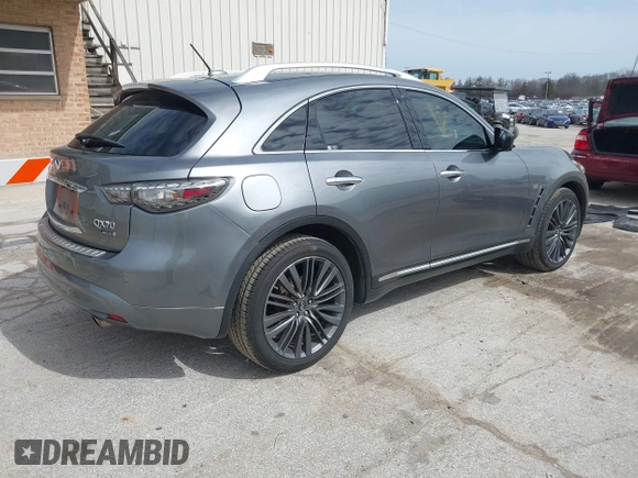 2017 Infiniti QX70 z VIN JN8CS1MW9HM412647, wystawiony jako IAAI lot #41830232 z przebiegiem 114 954 mil mil oraz . Historia ofert i sprzedaży dostępna na DreamBid. Obrazek 4.